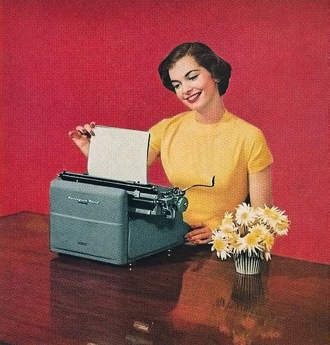 woman typing vintage